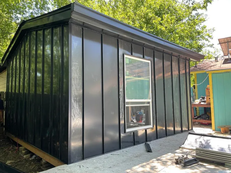 Black standing seam metal wall panels for Roof Inspection in Carol Stream